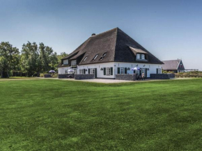 Spacious Farmhouse in De Cocksdorp with Garden